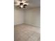 Spacious bedroom with tile flooring and ceiling fan at 11872 Iselle Dr, Orlando, FL 32827