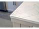 Close-up of kitchen island with modern white quartz countertop at 1333 W Smith St, Orlando, FL 32804