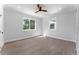 Bright bedroom with hardwood floors and ceiling fan at 1333 W Smith St, Orlando, FL 32804