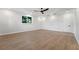 Bright bedroom featuring hardwood floors and ceiling fan at 1333 W Smith St, Orlando, FL 32804