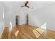 Bright bedroom with hardwood floors and ceiling fan at 1333 W Smith St, Orlando, FL 32804