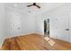 Bright bedroom with hardwood floors and ceiling fan at 1333 W Smith St, Orlando, FL 32804