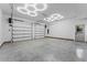 Large garage with epoxy flooring and modern lighting at 1333 W Smith St, Orlando, FL 32804
