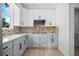 Modern kitchen with gray cabinets and quartz countertops at 1333 W Smith St, Orlando, FL 32804