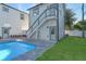 Modern pool with gray pavers and a detached pool house at 1333 W Smith St, Orlando, FL 32804