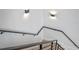 Modern staircase with metal railing and contemporary lighting at 1333 W Smith St, Orlando, FL 32804