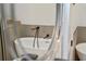 Modern freestanding bathtub with elegant black matte fixtures at 1333 W Smith St, Orlando, FL 32804