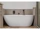 Modern bathtub with stylish fixtures in a renovated bathroom at 1333 W Smith St, Orlando, FL 32804