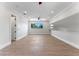 Spacious bonus room with hardwood floors and a ceiling fan at 1333 W Smith St, Orlando, FL 32804