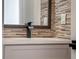 Stylish bathroom sink with a waterfall faucet and modern tile at 1333 W Smith St, Orlando, FL 32804