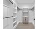 Spacious walk-in closet with ample shelving and hanging rods at 1333 W Smith St, Orlando, FL 32804