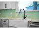 Modern farmhouse sink with black gooseneck faucet at 1333 W Smith St, Orlando, FL 32804