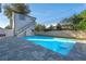 Inviting swimming pool with a spacious patio and modern pool house at 1333 W Smith St, Orlando, FL 32804