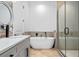 Elegant bathroom with a freestanding soaking tub and a large walk-in shower at 1333 W Smith St, Orlando, FL 32804