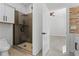 Modern bathroom with a large glass shower and a freestanding bathtub at 1333 W Smith St, Orlando, FL 32804