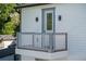 Private balcony with gray and white railings at 1333 W Smith St, Orlando, FL 32804
