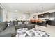Open-concept kitchen and living area with modern finishes at 287 Jetty Way, Davenport, FL 33897