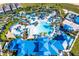 Aerial view of a large community pool and water park at 287 Jetty Way, Davenport, FL 33897