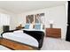 Spacious main bedroom with king bed, nightstands and ensuite bathroom at 287 Jetty Way, Davenport, FL 33897