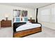 Main bedroom with a king-size bed and modern nightstands at 287 Jetty Way, Davenport, FL 33897