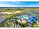 Large community pool and water park with expansive green space at 287 Jetty Way, Davenport, FL 33897