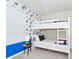 bedroom with bunk beds and Marvel themed wallpaper at 287 Jetty Way, Davenport, FL 33897