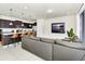 Modern kitchen with stainless steel appliances and an island at 287 Jetty Way, Davenport, FL 33897