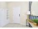 Bright entryway with built-in shelving and console table at 287 Jetty Way, Davenport, FL 33897