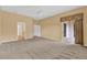 Large main bedroom with sliding door to patio at 4538 Nottoway Dr, Leesburg, FL 34748