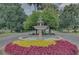 Ornate fountain at the entrance to a community at 4538 Nottoway Dr, Leesburg, FL 34748
