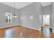 Bright dining room with tile floors and a chandelier at 4538 Nottoway Dr, Leesburg, FL 34748