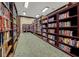 Community library with a wide selection of books and comfortable seating at 4538 Nottoway Dr, Leesburg, FL 34748