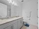 Double vanity bathroom with granite countertop at 528 Bellissimo Pl, Howey In The Hills, FL 34737
