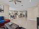 Open concept kitchen with an island, stainless steel appliances and granite countertops at 528 Bellissimo Pl, Howey In The Hills, FL 34737