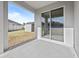 Covered patio overlooking fenced backyard with shed at 528 Bellissimo Pl, Howey In The Hills, FL 34737