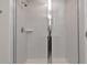 Large walk-in shower with glass enclosure and white tiles at 17608 Saw Palmetto Ave, Clermont, FL 34714