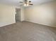 Bright and airy bedroom with neutral carpeting and ceiling fan at 1711 Shadow View Cir # 1711, Maitland, FL 32751