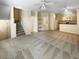 Spacious living room with neutral carpeting and high ceilings at 1711 Shadow View Cir # 1711, Maitland, FL 32751