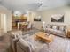 Open concept living and kitchen area with neutral tones at 1711 Shadow View Cir # 1711, Maitland, FL 32751