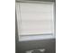 Small bathroom with toilet and window blinds at 401 Martin Luther King Jr Ave, Wildwood, FL 34785
