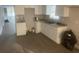 Newly remodeled kitchen with white cabinets at 401 Martin Luther King Jr Ave, Wildwood, FL 34785