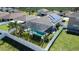 Aerial view showcasing the home, pool, and backyard at 356 Nova Dr, Davenport, FL 33837
