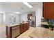 Island kitchen features stainless steel appliances and granite countertops at 356 Nova Dr, Davenport, FL 33837