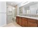 Elegant bathroom with double vanity and walk-in shower at 356 Nova Dr, Davenport, FL 33837