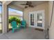 Relaxing screened porch with patio furniture and access to the backyard at 356 Nova Dr, Davenport, FL 33837