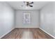 Bright bedroom with wood-look floors and ceiling fan at 356 Nova Dr, Davenport, FL 33837