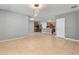 Open dining area with kitchen view and tile flooring at 356 Nova Dr, Davenport, FL 33837