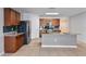 Modern kitchen with stainless steel appliances and granite countertops at 356 Nova Dr, Davenport, FL 33837