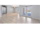 Bright and airy living room with tile floors and access to patio at 356 Nova Dr, Davenport, FL 33837