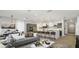 Open concept living area with a grey couch and kitchen island at 12614 Clear Sapphire Dr # 137, Winter Garden, FL 34787